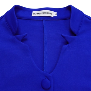 Detail view of royal blue flared sleeve top with notch lapel collar and matching buttons