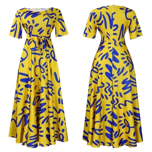 Detail view of African print A-line dress with yellow base, blue patterns and waist tie