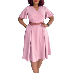 Detail of pink V-neck dress with flare sleeves and brown waist belt for women