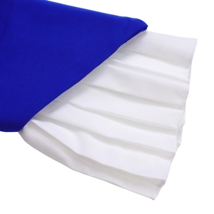 Detail of royal blue flare sleeve with multi-layer white ruffle cuffs and pleated fabric