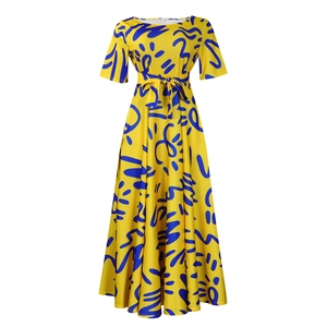 Detail of high-waist A-line dress with yellow floral print, waist tie, and flared sleeves