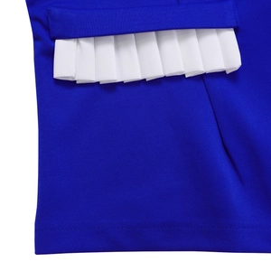 Macro detail of dark blue knit fabric with contrasting white pleated hem trim