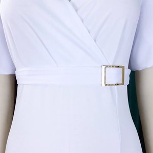 Close-up of white V-neck dress featuring a waist belt with a golden square metal buckle