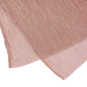 Detailed close-up showing the pleated texture and champagne gold metallic sheen of the fabric