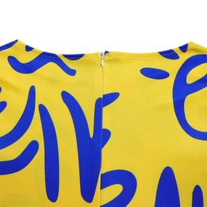 Detail of invisible back zipper on yellow African print dress with blue patterns