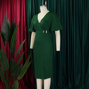 Detail of V-neck dark green dress featuring bell sleeves and a waist belt with gold buckle
