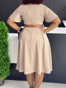 Chic beige V-neck A-line dress with wide brown belt and elegant bell sleeves for women