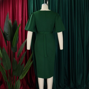 Rear view of dark green midi dress with puff sleeves and invisible back zipper