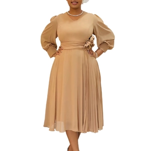 Detail of V-neck khaki midi dress featuring lantern sleeves and floral waist accents