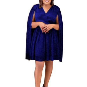 Detail of elegant V-neck dark blue glitter dress featuring unique cape sleeves style