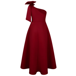 Detail shot of oversized bow on burgundy one-shoulder formal evening dress