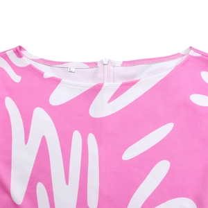 Detail of pink African print dress featuring round neck, back zipper, and size L tag