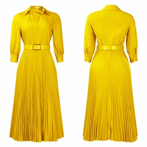 Detailed macro view of the bright yellow pleated fabric and stylish waist belt design