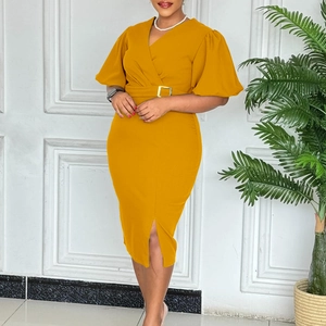 Detail of v-neck puff sleeve dress in ginger yellow with stylish waist belt and square buckle