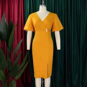 Detail of V-neck puff sleeve dress with waist belt and side slit in bright yellow