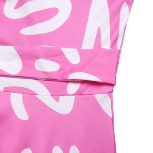 Close-up of the African print dress seam showing textured fabric and waist detail