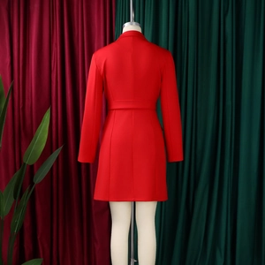 Rear view of long sleeve red blazer dress featuring fitted waist belt and sharp tailoring