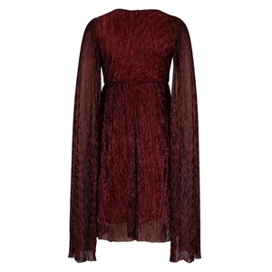 Detailed back view of deep red pleated evening dress with shimmering metallic cape sleeves