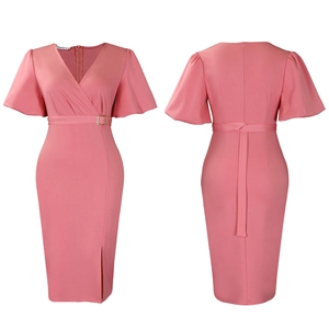 Detail of rose pink V-neck dress featuring a gold buckle belt and front slit detail