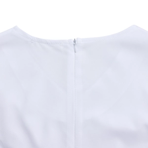 Detail view of the hidden back zipper and neckline of the white A-line dress