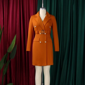 Detail view of orange double-breasted blazer dress with belt and silver buckle
