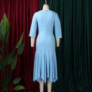 Detail of the light blue midi dress showing the 3/4 sleeves and invisible back zipper