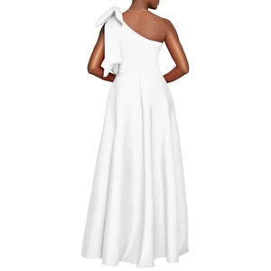 Rear view of white one-shoulder evening gown with large bow detail and A-line silhouette
