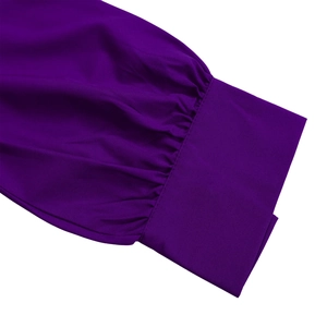 Detailed close-up of dark purple long sleeve cuff with pleated texture and neat stitching