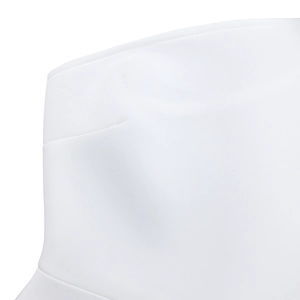 Detail view of white dress fabric showing high-quality stitching and smooth texture