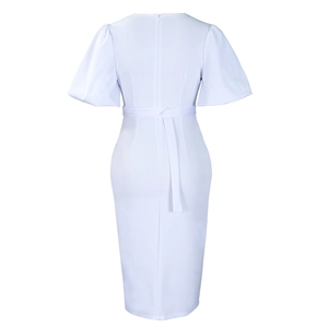 Back view of white V-neck dress with puff sleeves and invisible zipper closure