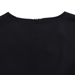 Macro shot of back neckline with hidden zipper on elegant black A-line dress