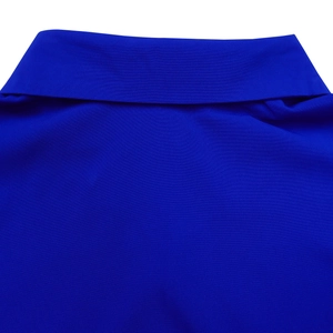 Detail of dark blue shirt dress showing the classic turnover collar and fabric texture