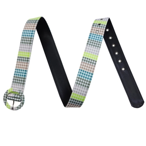 Detail of colorful plaid belt with round buckle and metal eyelets for African dress