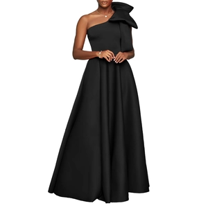 Detail of elegant black one-shoulder satin evening gown with large bow accent