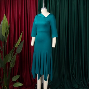 Detail of elegant asymmetric neck and ruched high waist on a slim bodycon dress
