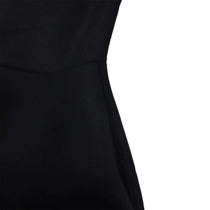 Detailed view of side seam stitching and waist contour on this elegant black dress
