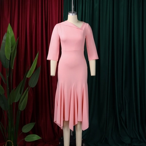 Detail of light pink slim fit midi dress with asymmetric neckline and mermaid hem