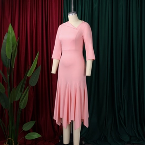 Detail of pink midi dress showing unique asymmetric folding collar and slim three-quarter sleeves