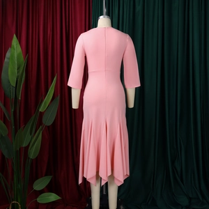 Detail view of pink dress back showing the invisible zipper and irregular mermaid hem
