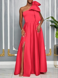 Elegant red one-shoulder evening gown with large bow detail and high side slit