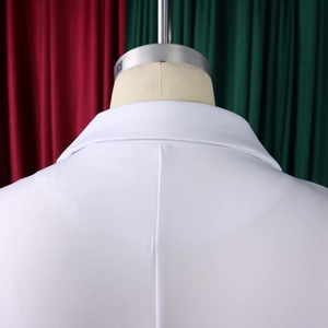 Detail view of white long-sleeve blazer dress collar and back tailoring on a mannequin