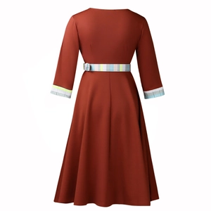 Detail view of the rust red A-line dress back with colorful checkered belt and sleeve cuffs