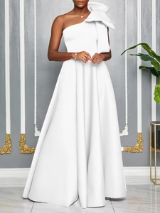 Elegant white one-shoulder maxi dress featuring a large bow and a wide A-line skirt silhouette