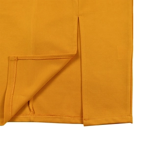 Detailed close-up of side slit and precision stitching on yellow V-neck maxi dress