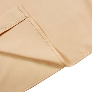 Close-up of fine double-needle stitching on beige fabric for loose lapel shirt dress
