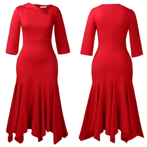 Detail of red asymmetrical collar and irregular fishtail hem on high-waist dress