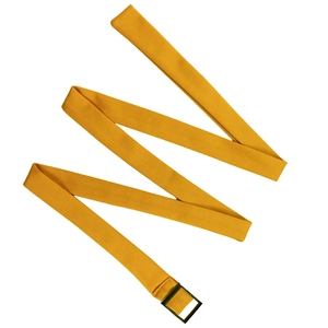 Detail of mustard yellow canvas woven belt with bronze metal buckle on white background