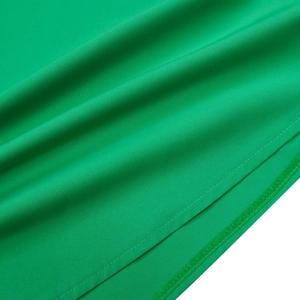 Macro shot of emerald green fabric texture and high-quality hem stitching detail