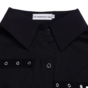 Detail of black shirt collar with brand label and metallic eyelet decorative webbing