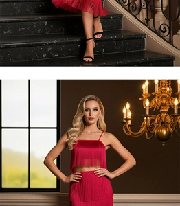 Close-up of red fringe two-piece set featuring tassel crop top and matching party skirt